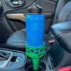 A green car cup holder adapter holding a 32 oz hydro flask water bottle