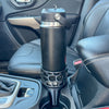 A black car cup holder adapter holding a 26 oz yeti water bottle